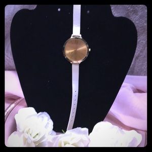 Gold Tone Watch with white strap